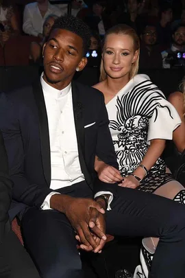 Professional basketball player Nick Young (L) and singer Iggy Azalea attend the 2014 MTV Video Music Awards