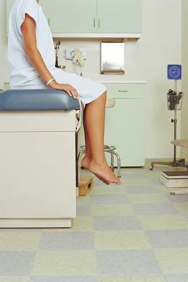 Female patient on exam table