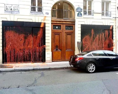 Kidult vandalises Kanye West Life of Pablo pop-up store in Paris.