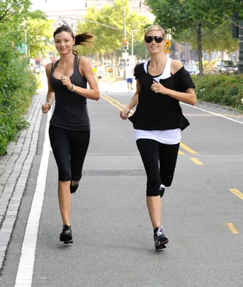 Miranda Kerr and Heidi Klum running