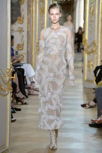 J Mendel Couture.