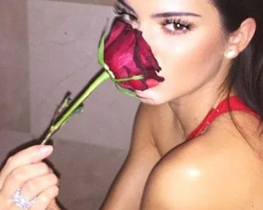 Kendall Jenner smelling rose