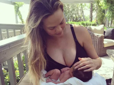 Chrissy Teigen with baby Luna Stephens