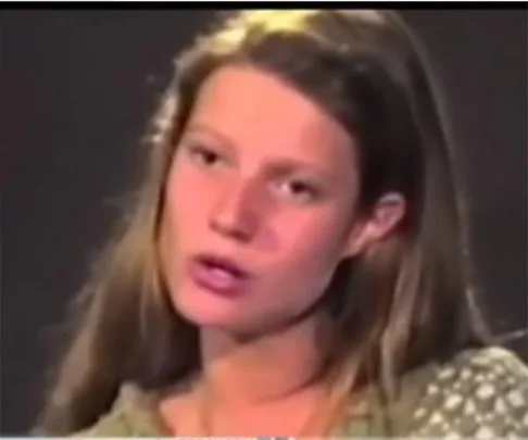 Young woman with long hair in a polka dot top auditioning, identified as Gwyneth Paltrow from "Se7en" auditions.