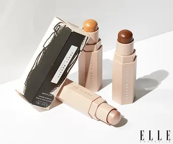 Fenty Beauty Match Stix makeup sticks in various shades with packaging, photographed on white background.