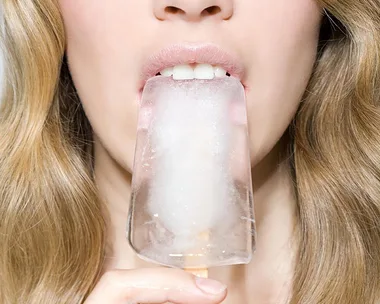 Woman with popsicle.