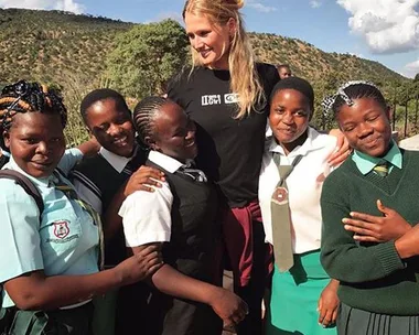 Toni Garrn with the Zimbabwean girls she is helping through the Toni Garrn Foundation and Plan International