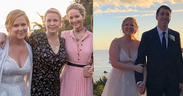 Amy Schumer at her wedding with guests on left and with her spouse on right, all smiling in an outdoor setting.