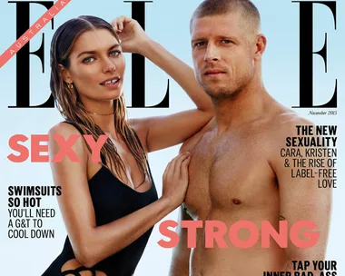 Cover of Elle Australia November 2015 featuring a woman in a black swimsuit and a shirtless man hugging each other.