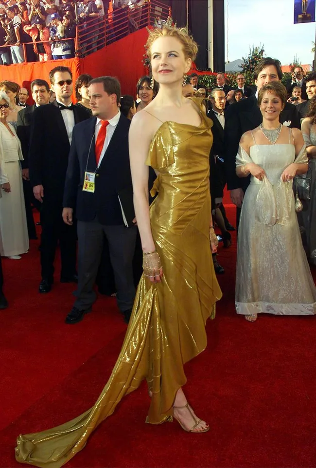 The Most Iconic Gold Dresses In Fashion History The Most Iconic Gold Dresses In Fashion History