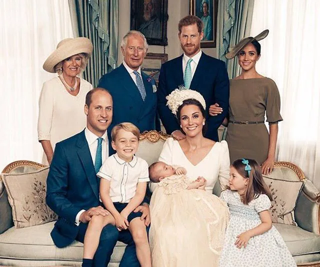 Royal family portrait taken at Prince Louis' christening, with family members posing together indoors.