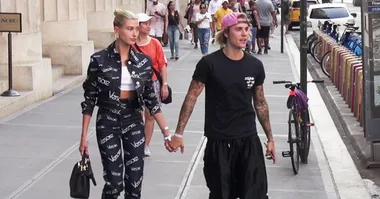 Justin Bieber and Hailey Baldwin holding hands. 