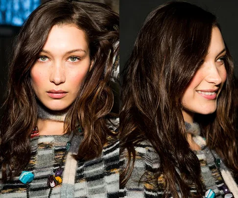 Close-up shots of a woman with long, wavy brown hair, looking directly at the camera and smiling in a side profile.