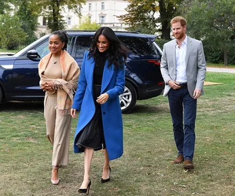 Prince Harry, Meghan Markle and Doria Ragland. 