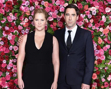 Amy Schumer and Chris Fischer.