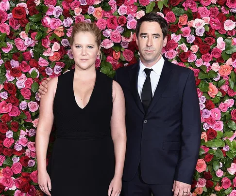 Amy Schumer and Chris Fischer.