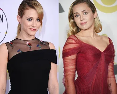 Two women at a formal event: one in a black dress with floral embroidery and the other in a red off-shoulder dress.