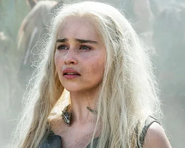 A woman with long white hair looking concerned, from Game of Thrones.