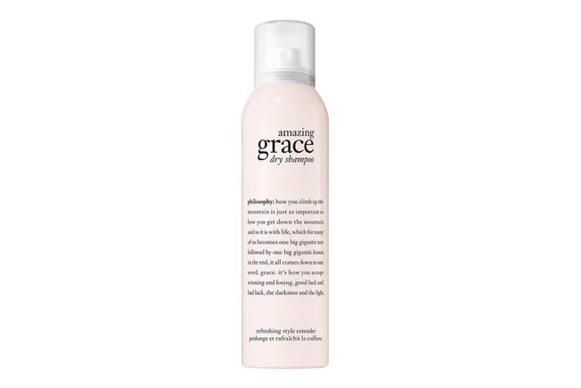 Amazing Grace dry shampoo by Philosophy in a white spray bottle with text detailing product benefits.