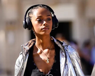 Model wearing headphones.