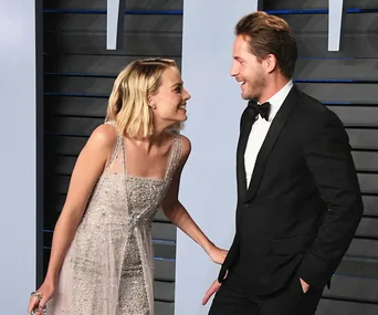 Margot Robbie and Tom Ackerley.