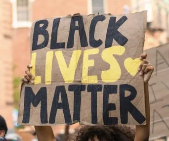 black lives matter sign at a protest