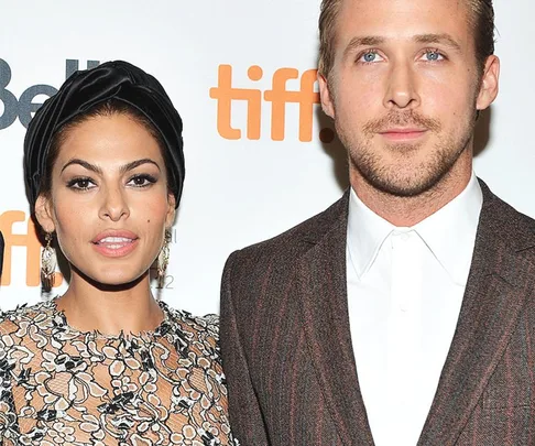 A man and woman pose together at the Toronto International Film Festival, smiling at the camera.