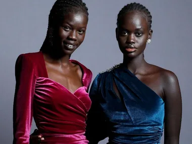 Two models in elegant velvet dresses pose for Rebecca Vallance at Australian Fashion Week 2021.