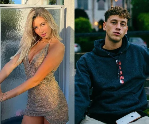 Blonde woman in a sparkly dress and young man in a hoodie, posed outdoors.