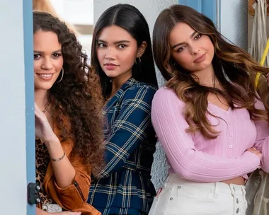 Three young women leaning on a doorway, smiling and looking ahead, from "He's All That" movie.