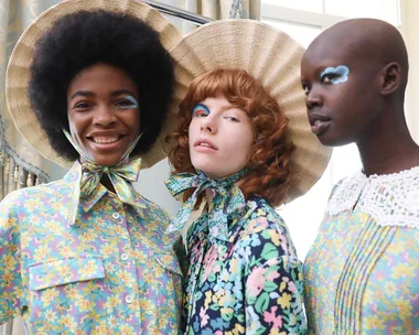 Models in floral outfits and bold makeup at London Fashion Week Spring/Summer 2022.