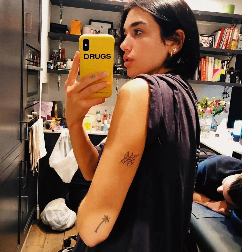 Dua Lipa's Tattoos: What They Are And What They Mean