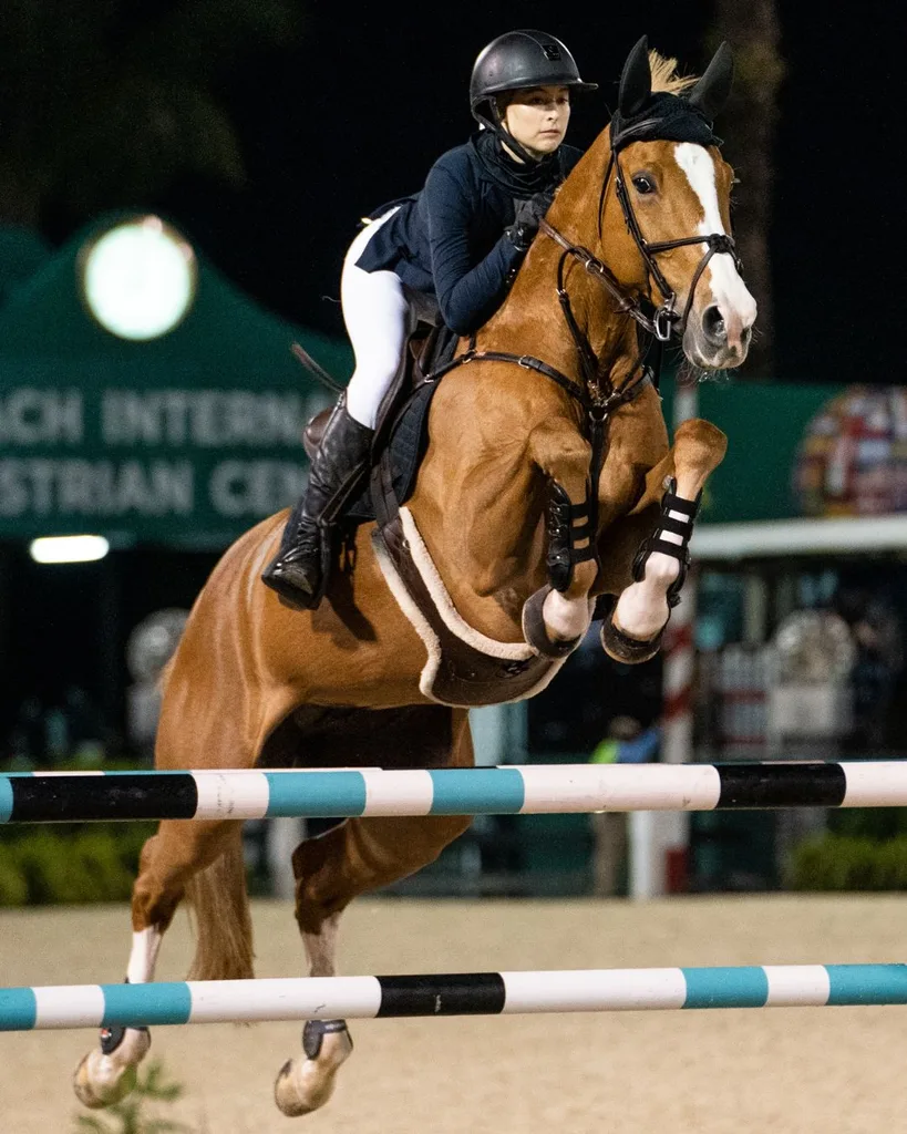 Eve Jobs show jumping