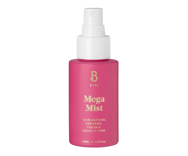 Pink bottle of BYBI Mega Mist facial spray, labeled 100% natural, vegan, and cruelty-free, 50ml size.