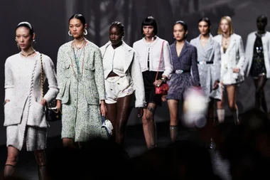 Models walking down the runway at Chanel Paris Fashion Week SS23, showcasing elegant, modern outfits.