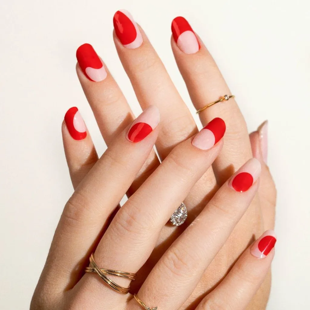 Swirling pillar box red nails