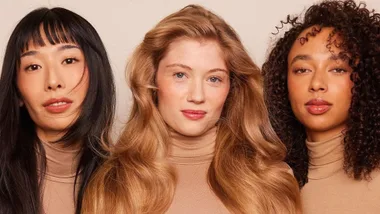 Three models with different hair types and ethnicities pose side by side.