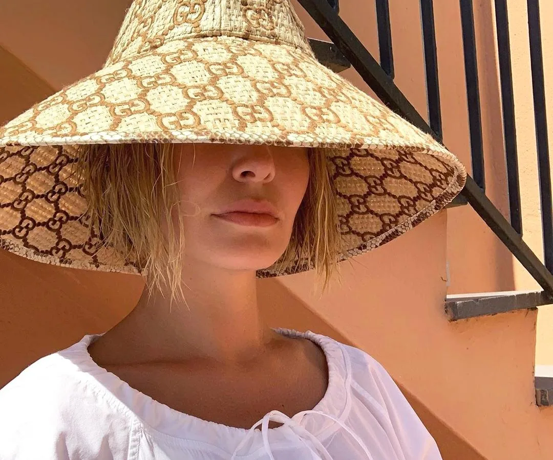 Lara Worthington wearing a Gucci hat.