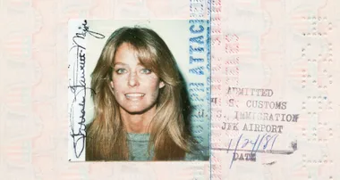 A vintage passport photo featuring a woman with long hair, smiling; U.S. customs stamp visible.