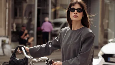 Lea Naumann walks with a bicycle outside Copenhagen, Denmark