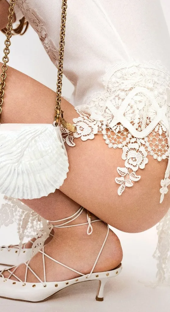 Close up photo of a model wearing all-white