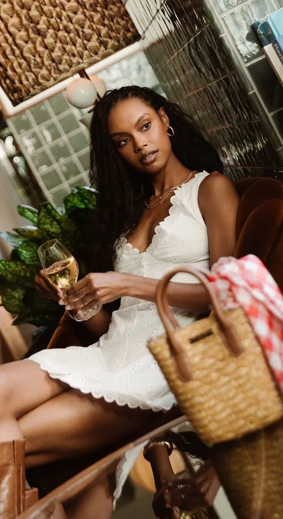 Model wearing a white dress