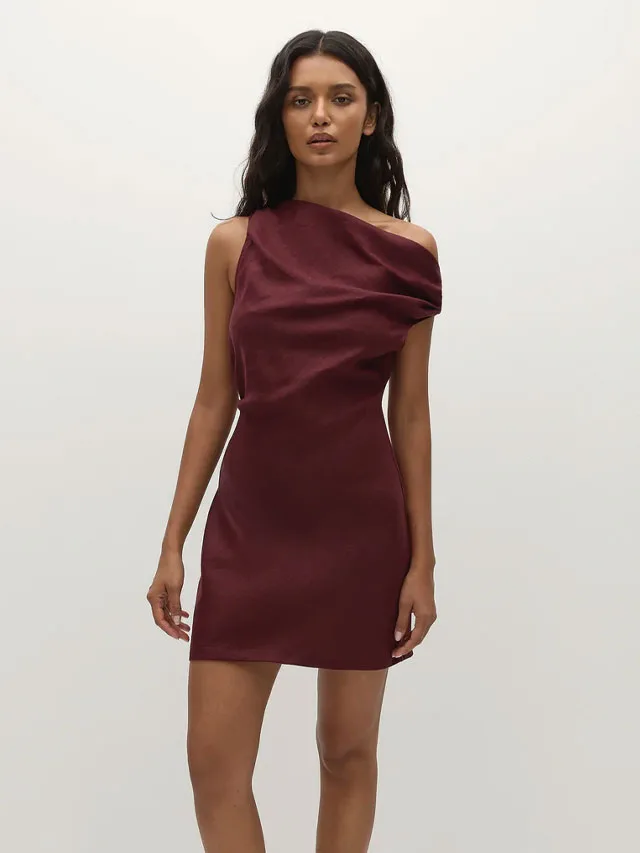 Model wearing a wine-coloured linen mini dress