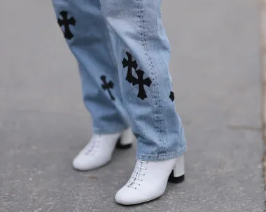 Ankle boots with jeans at Paris Fashion Week 2024.