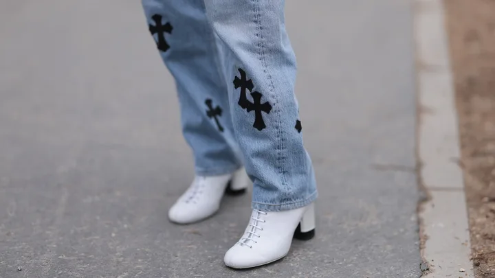 Ankle boots with jeans at Paris Fashion Week 2024.