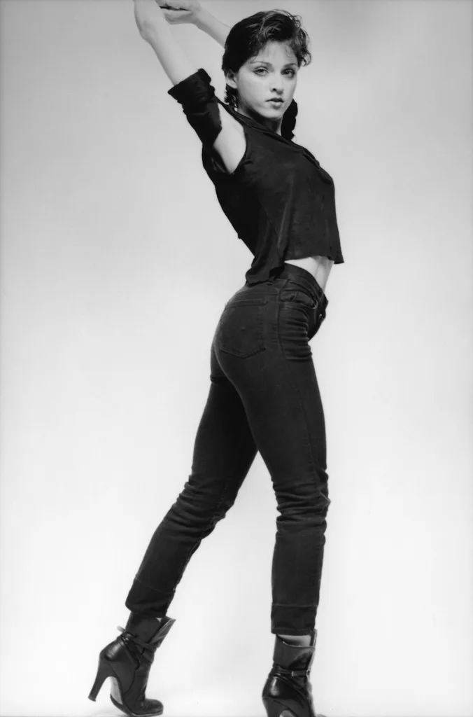 Madonna in 1979, wearing ankle boots with black jeans.