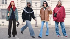Multiple women wearing different styles of flared jeans