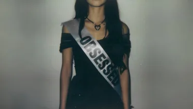 olivia rodrigo wears a sash that reads 'obsessed'