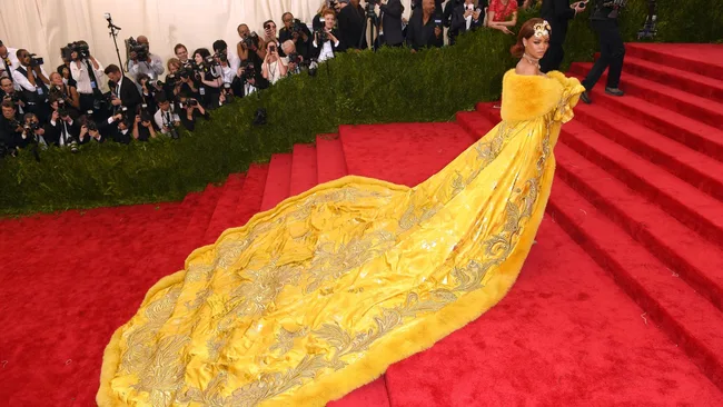 rihanna met gala yellow dress long train