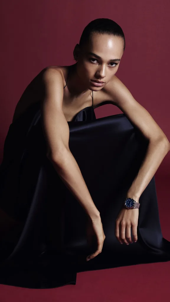 model annemary aderibigbe wearing the victoria beckham breitling watch